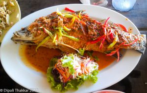 Fried fish with curry source